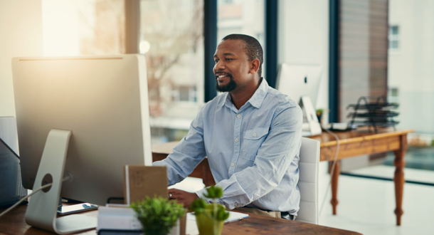 Man working on desktop in an office
