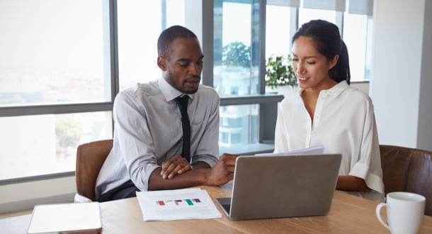 Colleagues working together on a laptop