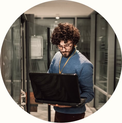 male business casual worker in server room 